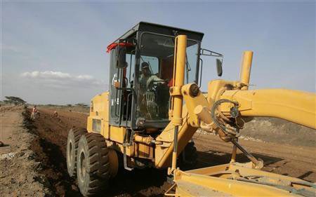 Motor grader carrying out road formation works